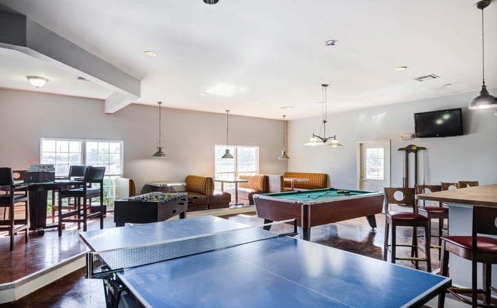 mustang village apartments wichita falls texas clubhouse game room ping pong table billiard table and foosball table